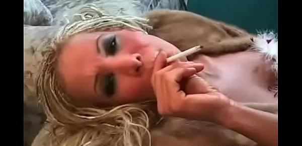  Steamy chick smoking a fag
